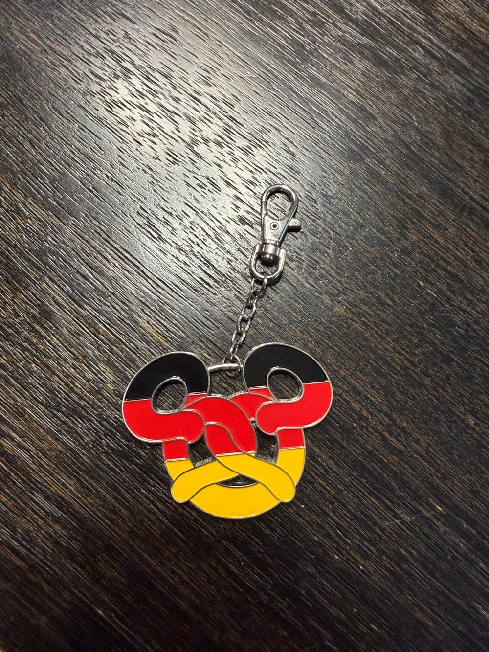 Disney epcot Germany pretzel Keychain bag charm in Black, Red & Yellow - Picture 1 of 2